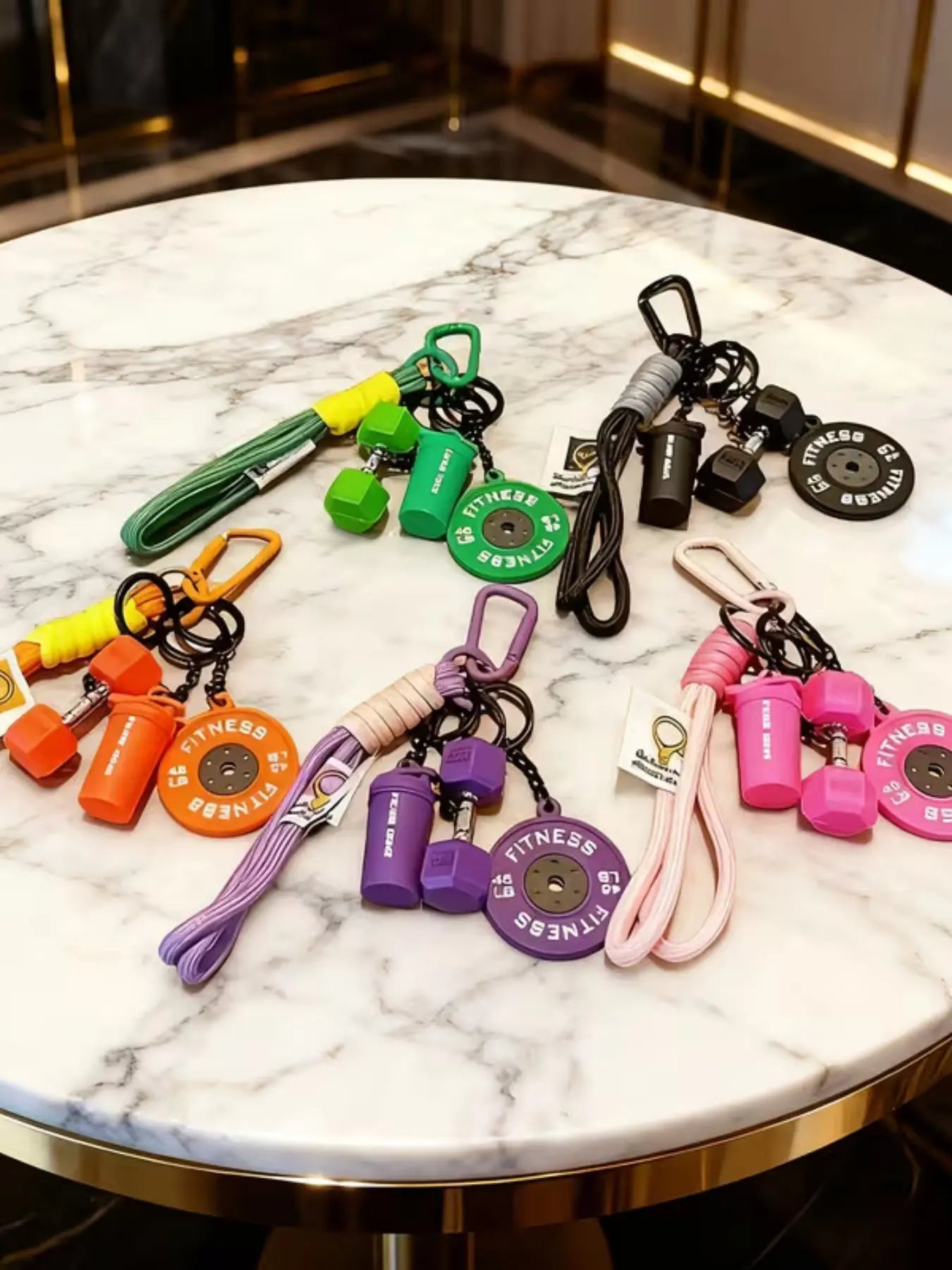 Unleash Your Workout Style with Our Trendy 4-Piece Sporty Barbell Keychain Set – The Ultimate Gym Accessory!